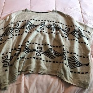 Oversized poncho with sleeves